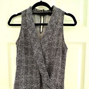 Gently worn tank top with gathered waistline